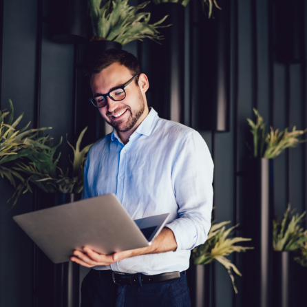 Man holding a laptop